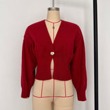 קרדיגן קצר אלגנטי עם סגירת V וכפתור דקורטיבי