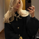 קרדיגן סרוג אוברסייז חמים עם כפתורים