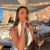 טופ סאטן אלגנטי עם קשירת צוואר ונפילה מחמיאה